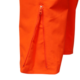 Close-up of orange hi-vis workwear trousers with an open ankle zipper