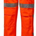 High-visibility orange work trousers with kneepad pockets and reflective strips