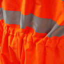 Hi-vis orange workwear with elasticated back and reflective tape for safety
